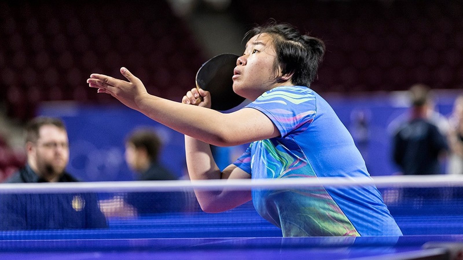 GTTC Academy player serving during competitive table tennis